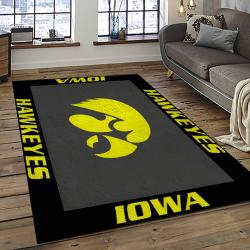 ncaa iowa hawkeyes college sport basketball and foolball team logo rectangle area rug dark room iwh44