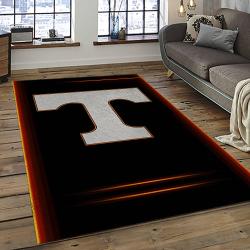 ncaa tennessee volunteers college sport basketball and foolball team logo rectangle area rug dark room tvs18