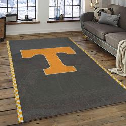 ncaa tennessee volunteers college sport basketball and foolball team logo rectangle area rug dark room tvs19
