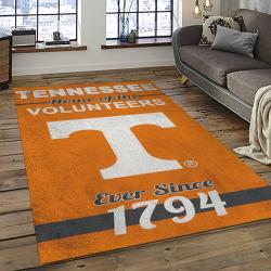ncaa tennessee volunteers college sport basketball and foolball team logo rectangle area rug dark room tvs34