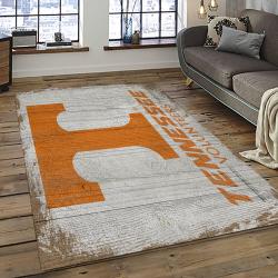 ncaa tennessee volunteers college sport basketball and foolball team logo rectangle area rug dark room tvs36