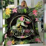 jurassic mom motherhood is walk in the park quilt d2384336